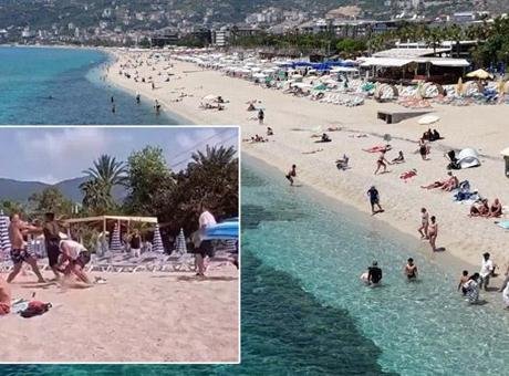 Alanya'da plajda İngiliz turiste şezlong dayağı! Skandal görüntünün bedeli ağır oldu
