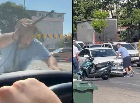 Dehşet anları! Aracın önünü kesti, sileceği kırıp cama yumruk attı